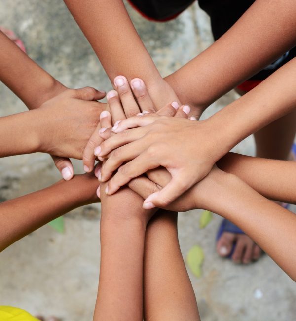 Group of hands holding together Group of hands holding together